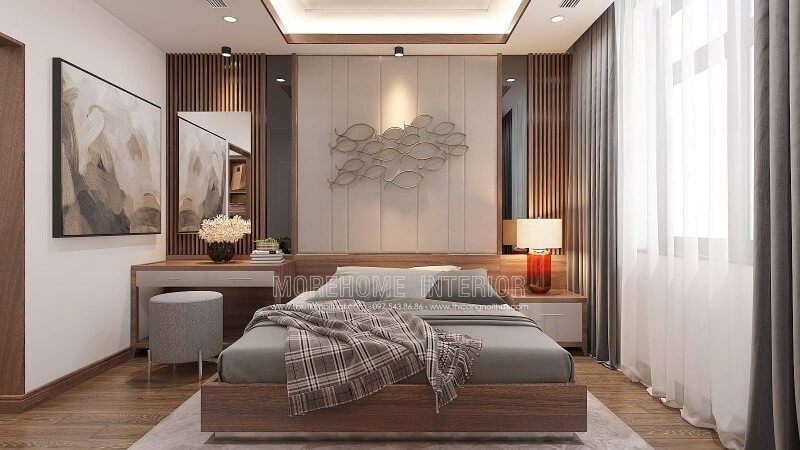 Mẫu thiết kế nội thất phòng ngủ nam tính dùng giường gỗ óc chó veneer hiện đại, liền mạch với tấm gỗ ốp tường hiện đại, được bố trí chiếm toàn bộ diện tích mảng tường dưới để tạo nên một không gian đẹp và thuận tiện cho việc vệ sinh, đặc biệt là phòng của cậu con trai.